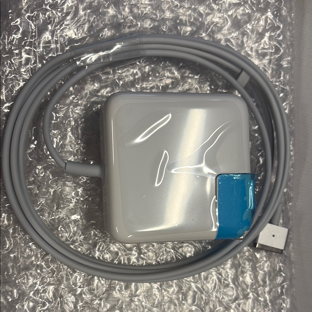 White Apple laptop charger/Power Adapter